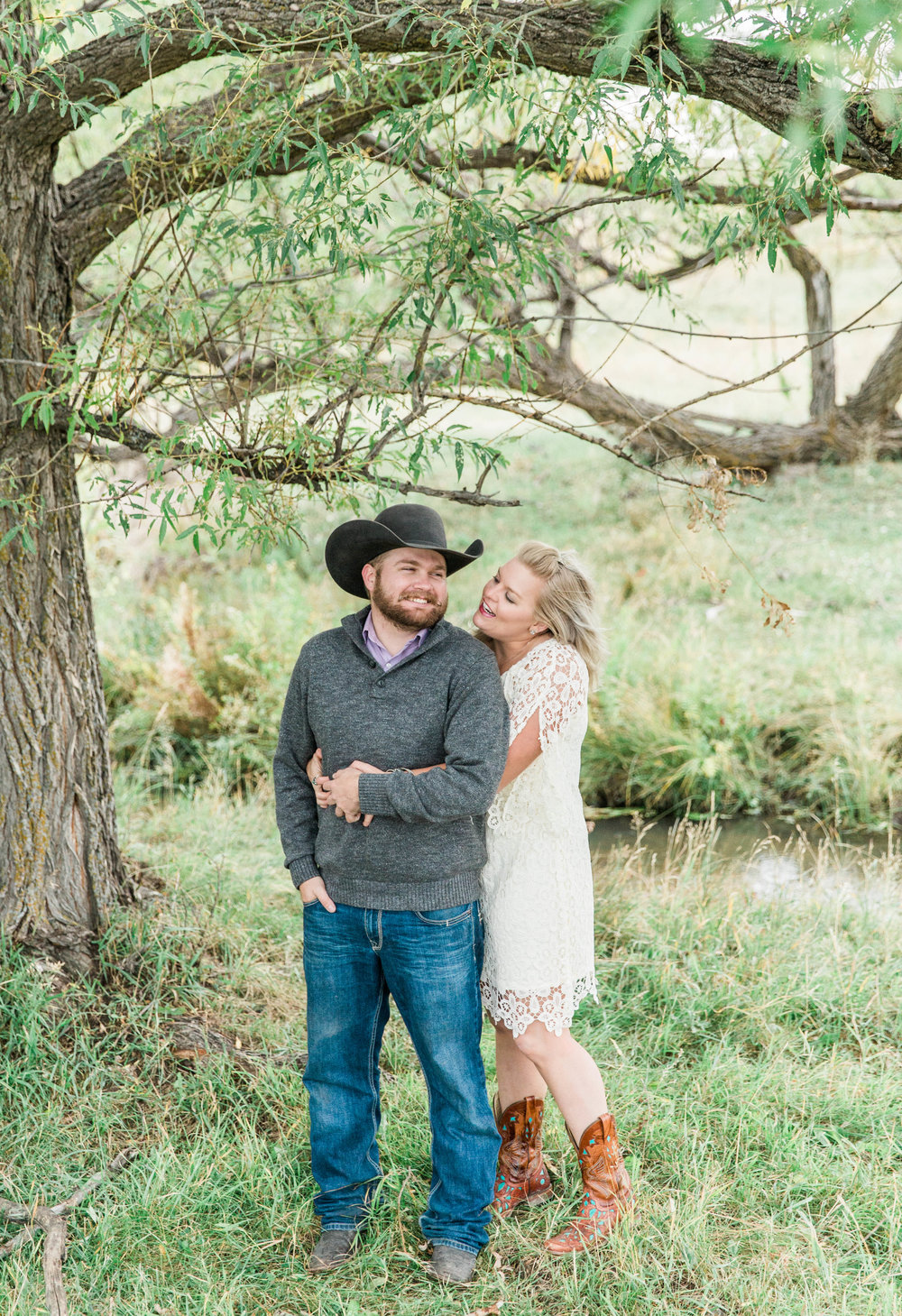 couple laughing Franktown Colorado Engagement Session