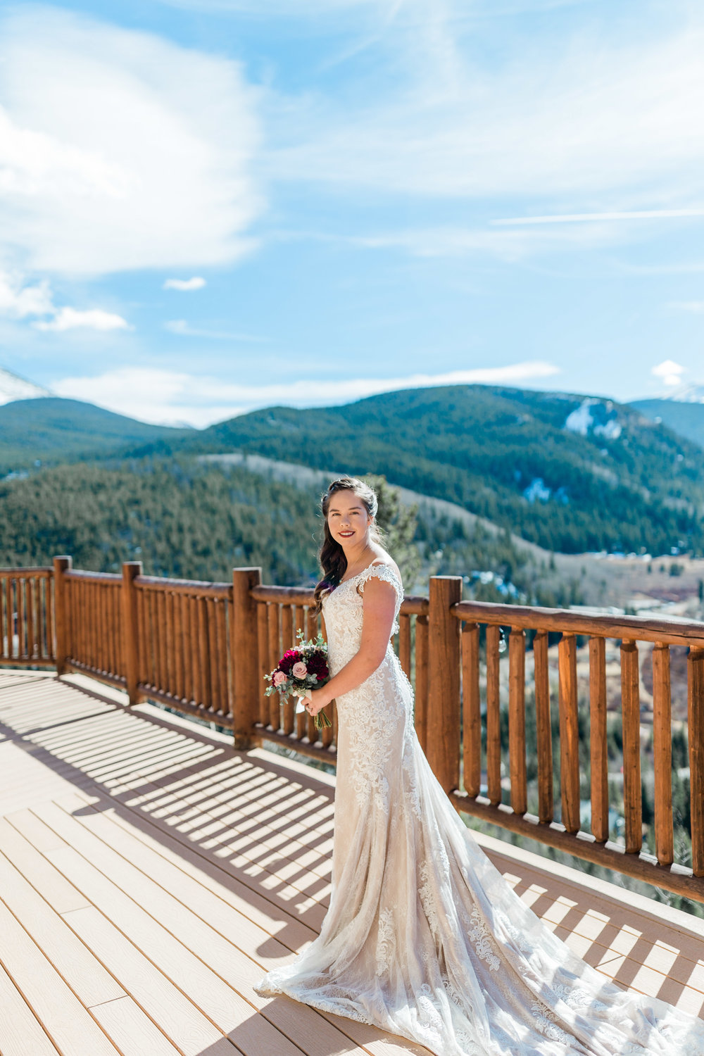 bride on deck at The Lodge at Breckenridge Wedding
