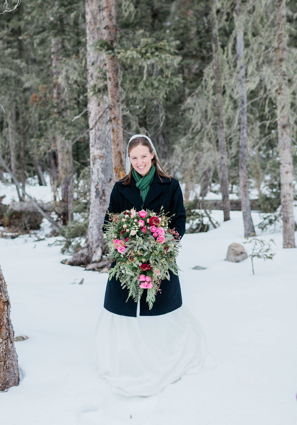 bride in the snow taos ski valley wedding