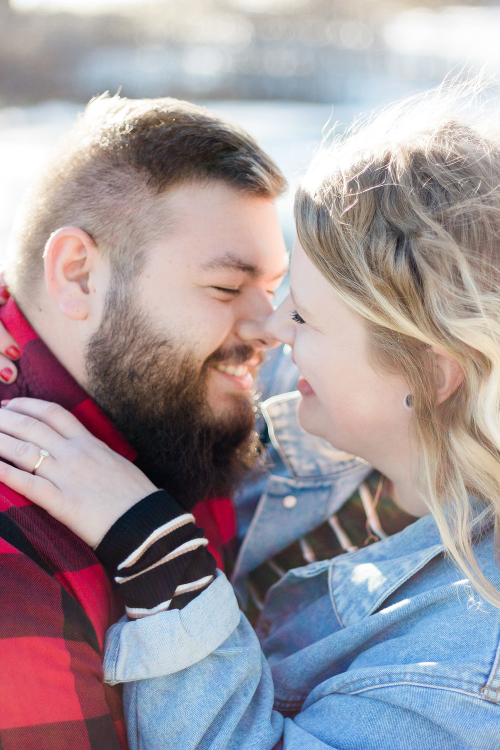 couple smiling in castle rock engagement session