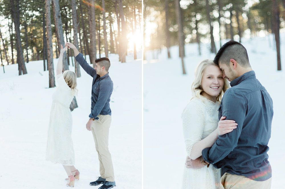 couple dancing in snow engagement session