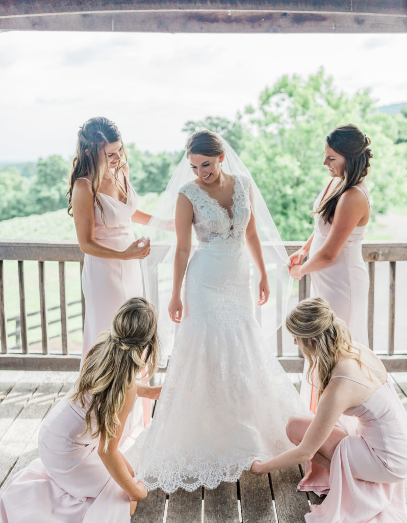 bride with her bridesmaids at bluemont vineyard