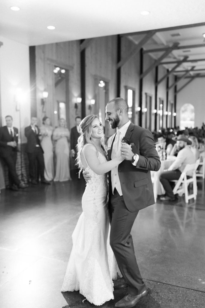 bride and groom sharing first dance at reception in ballroom at Crooked willow farms