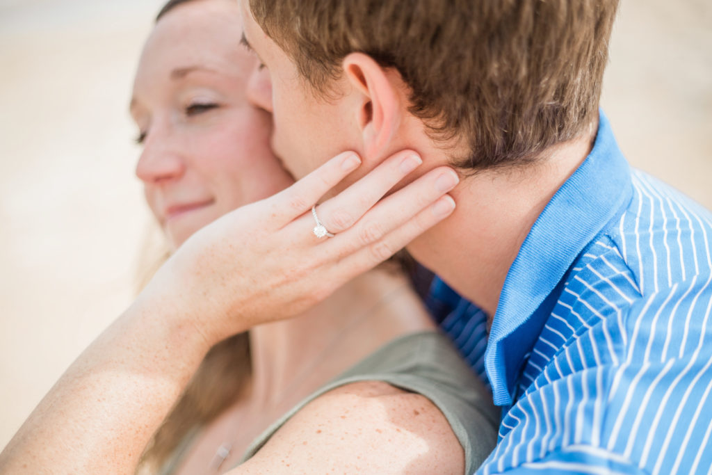 Bride with engagement ring during Palm Coast beach session