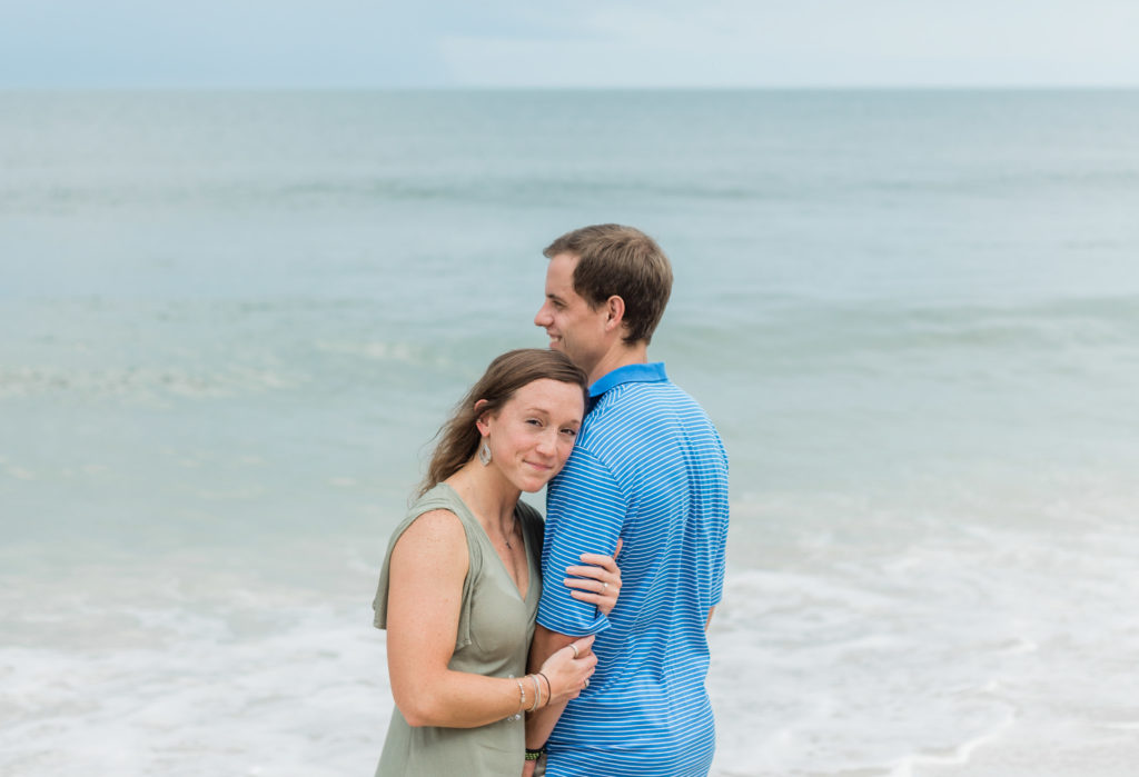 Couple on beach during Palm Coast engagement session