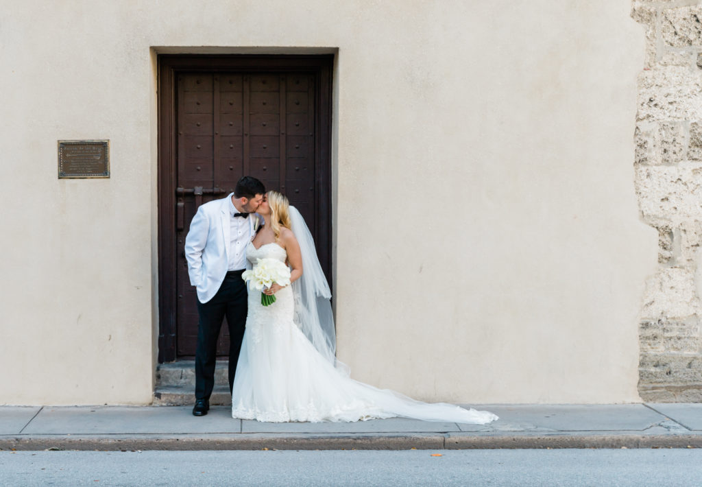 bride and groom kissing after wedding in St. Augustine.