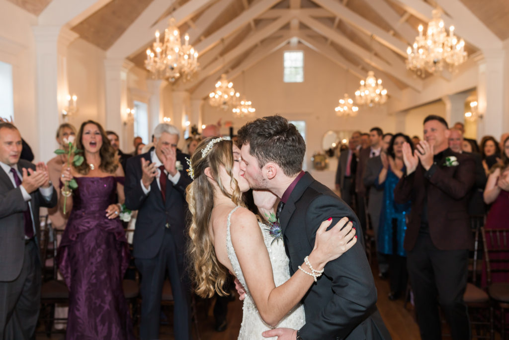 Couple kissing during ceremony at the Villa Blanca in St. Augustine.