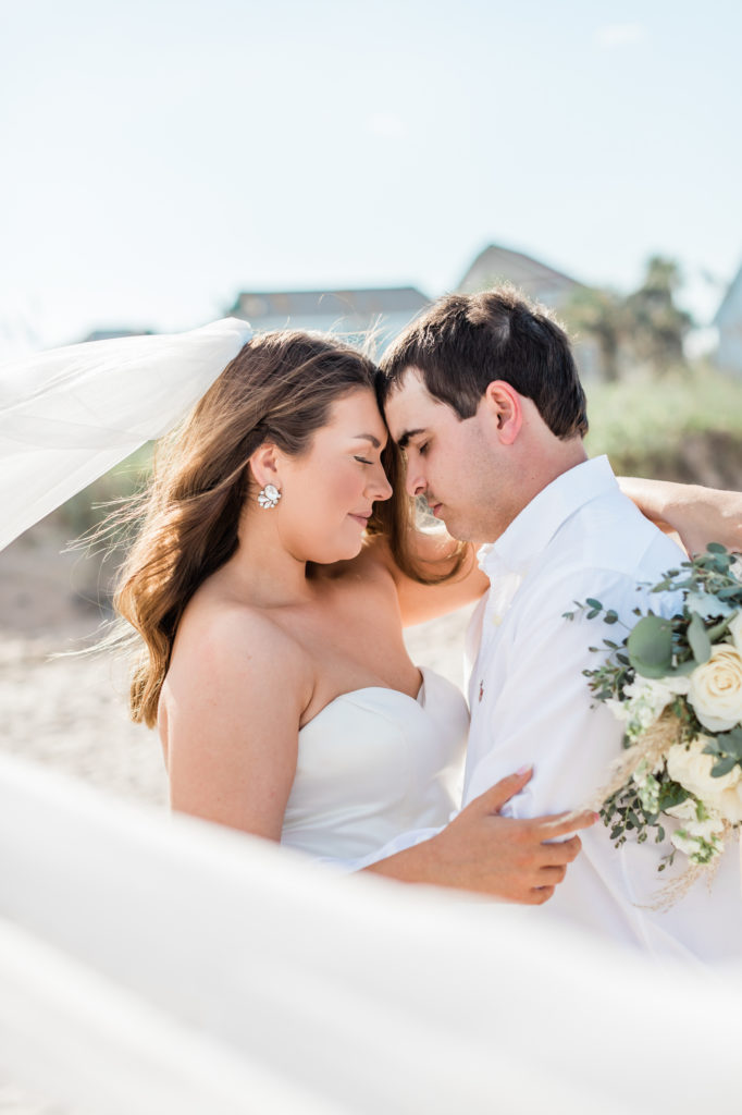Bride and groom on Vilano Beach elopement.
